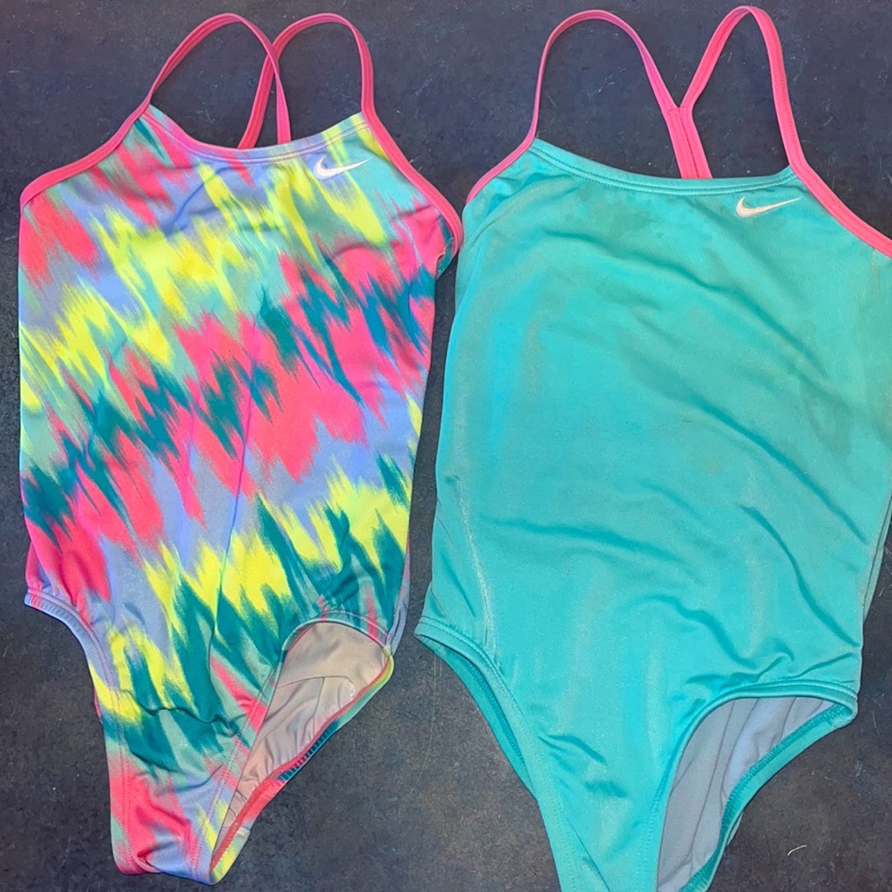 2 girls Nike swimsuits